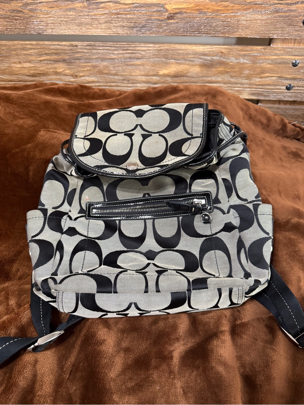 Coach Black and Cream Signature Canvas Backpack with Front Zip Pocket